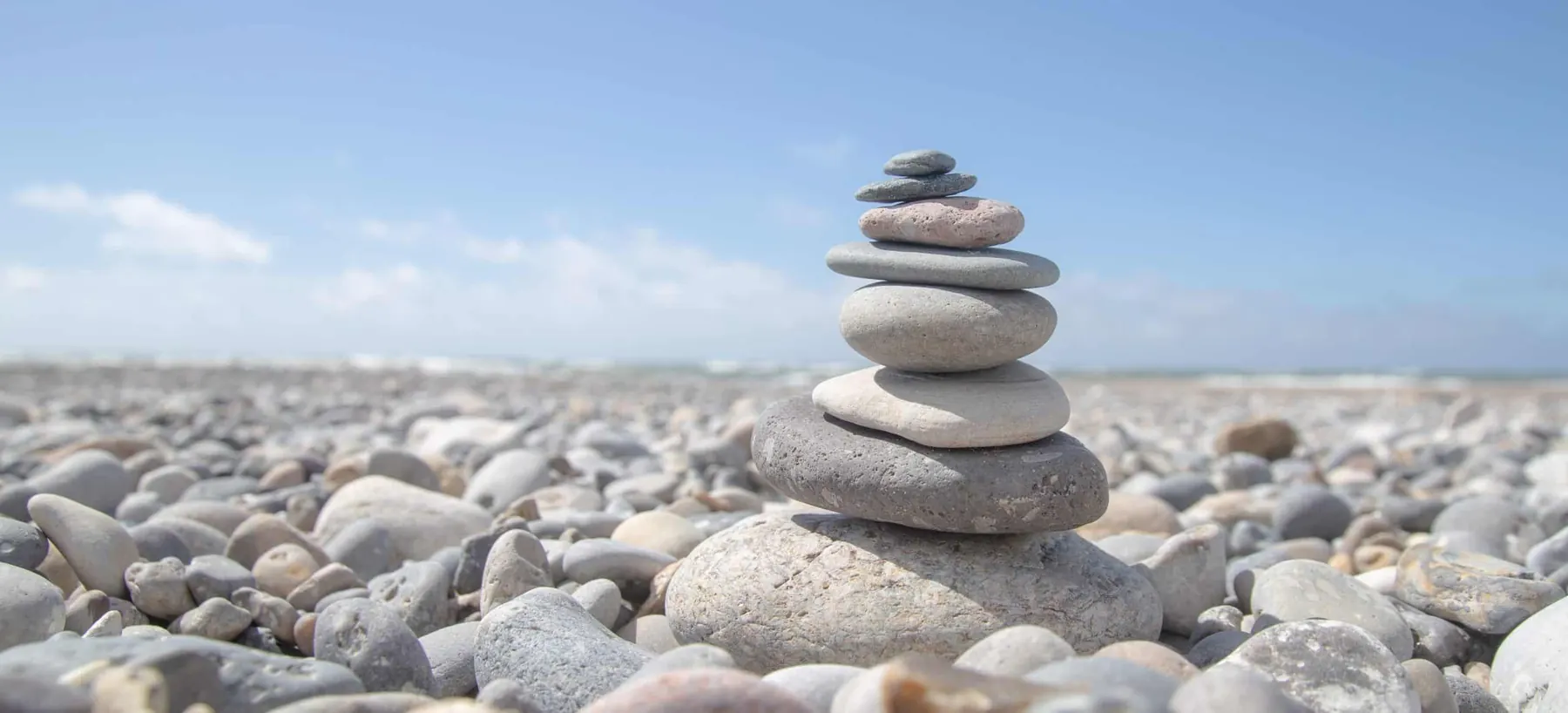 A beautiful shot of a stack of rocks on the beach
